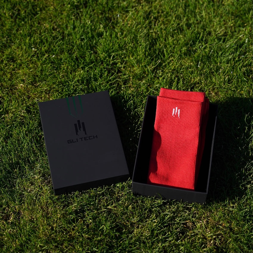 Chaussettes de football coupées rouge dans leur boite